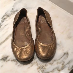 Tory Burch size 7.5 metallic gold flat